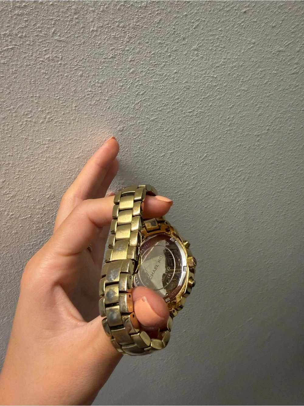 Michael Kors gold tone